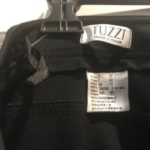 Tuzzi black pant with quilting on front. Back pockets size 38